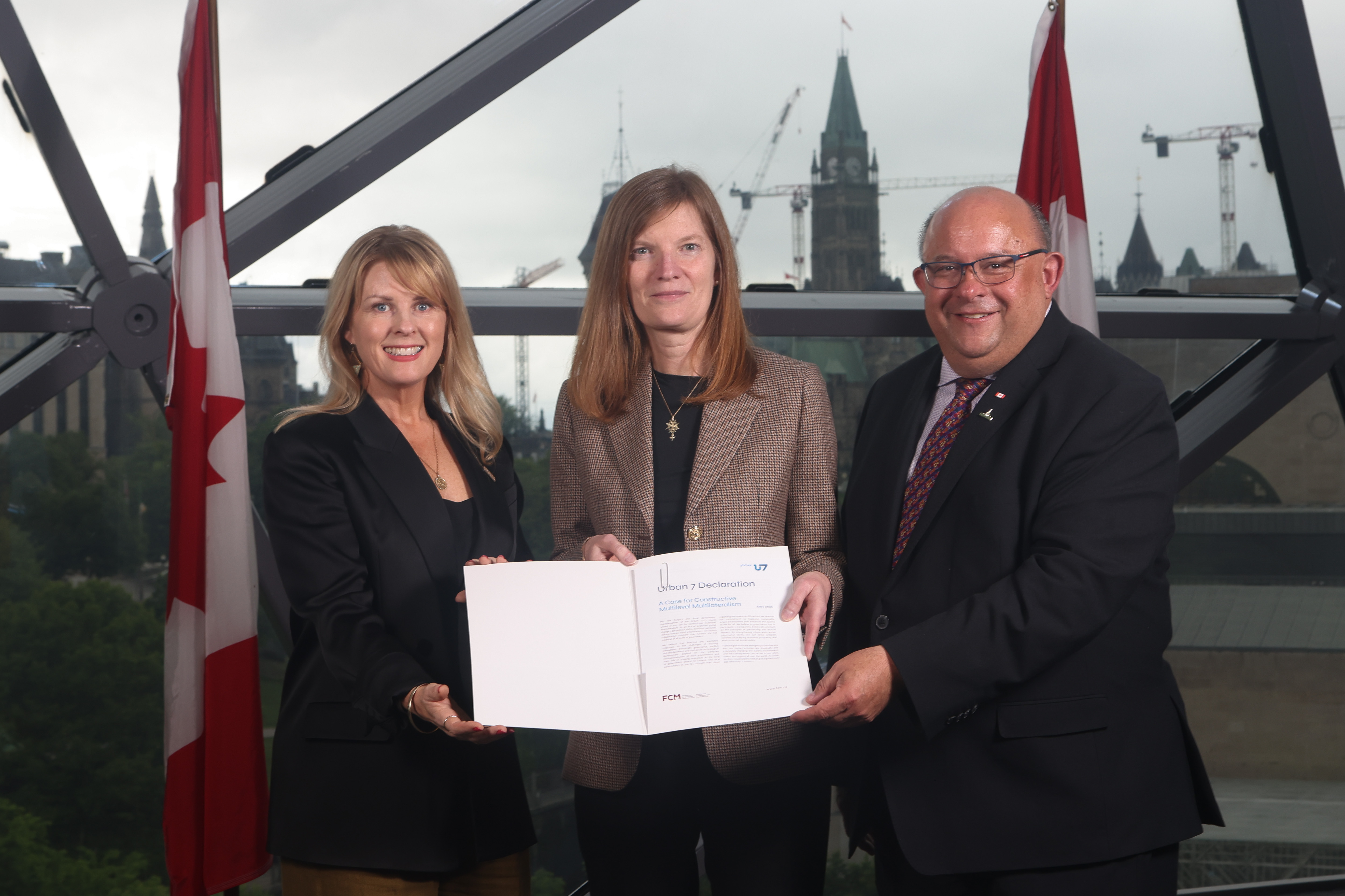 From left to right: Rebecca Bligh, FCM President, Cynthia Termorshuizen, Associate Deputy Minister of Foreign Affairs and Personal Representative of the Prime Minister of Canada for the G7 Summit, and Berry Vrbanovic, Mayor of Kitchener (CA).
